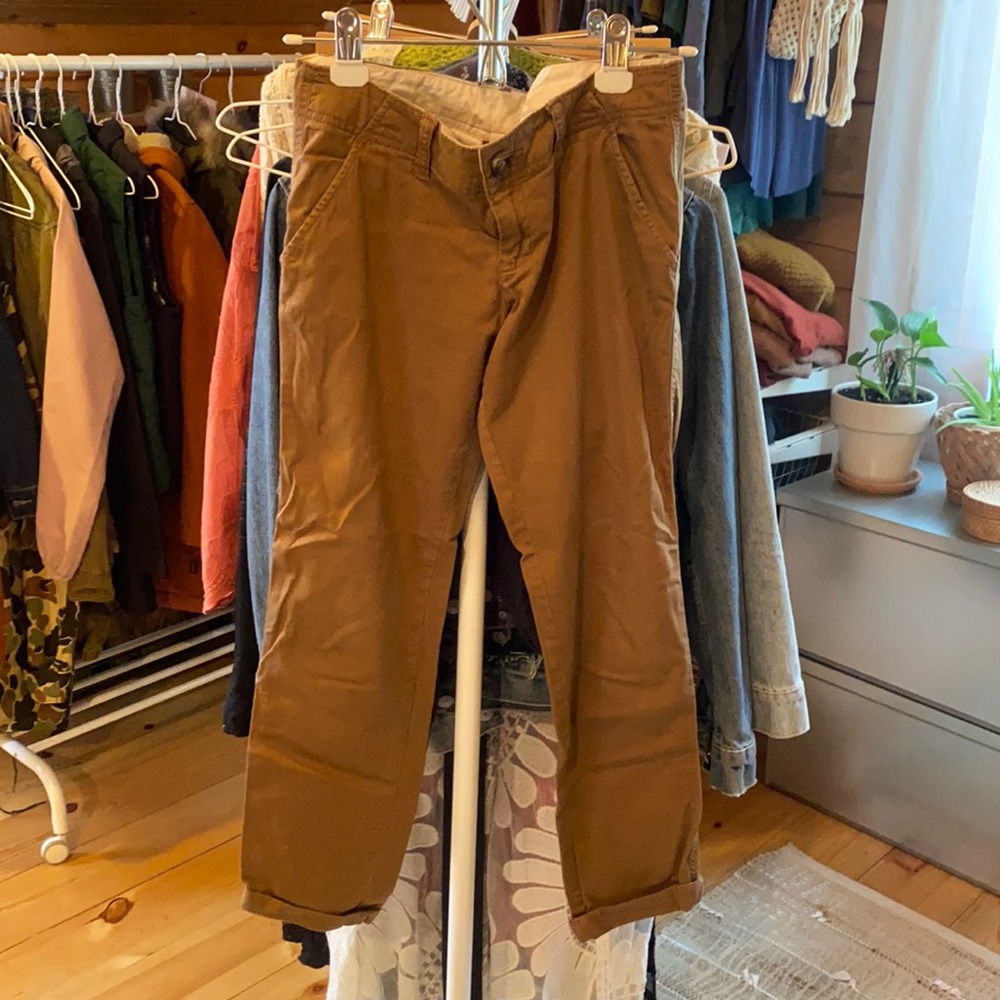 Low-rise Hollister chinos. Cropped.